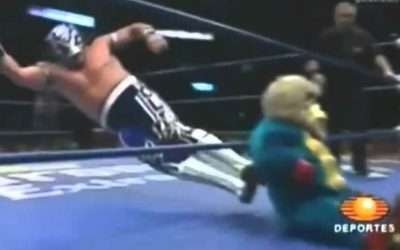 Mexican Wrestler Dropkicks Midget in a Monkey suit