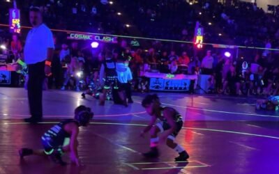 Glow n the dark wrestling tournament! LA kid pokes TX kid in the eye and he still gets the pin!